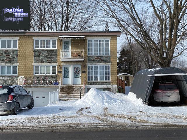 Property 3118a-3120 Ch. De La Riviere-Cachee main img