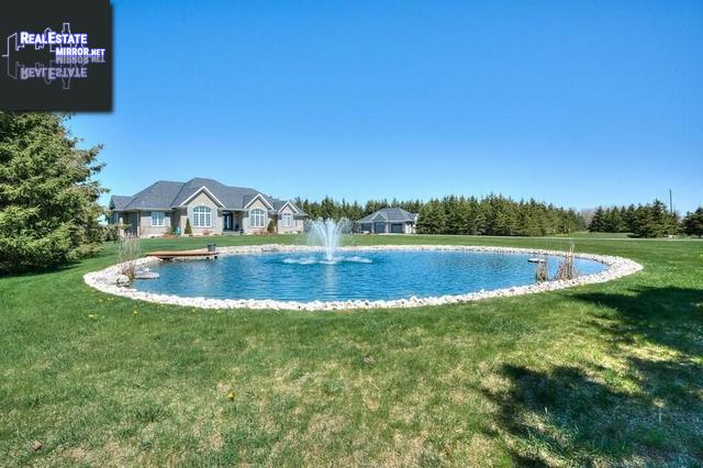 Property 7118 Wellington Rd 11 Road main img